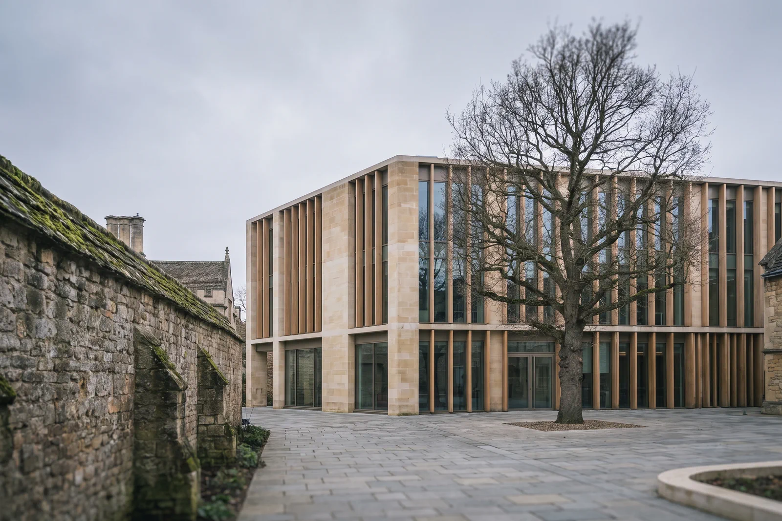 St Aldate's Learning Quarter — limestone academic building with timber fins
